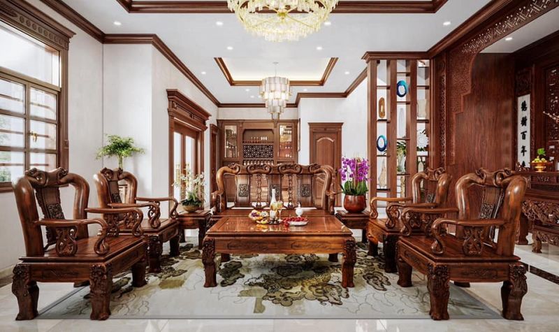 Không gian phòng khách sử dụng gỗ hương tạo nên bộ bàn ghế vô cùng ấn tượng 